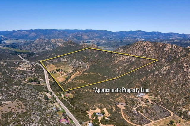 2483 Buckman Springs Rd, Campo, CA 91906 - aerial overview of property's location with a mountainous background and property boundaries highlighted