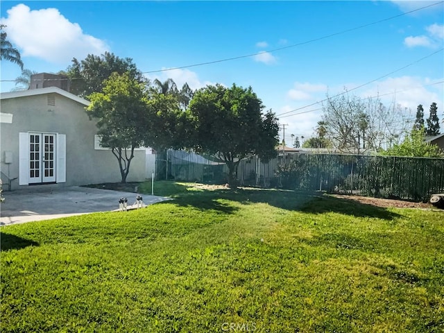 529 Esther Way, Redlands, CA 92373 - view of yard featuring fence, french doors, and a patio area