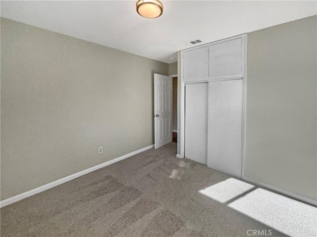 529 Esther Way, Redlands, CA 92373 - unfurnished bedroom with baseboards, visible vents, carpet floors, and a closet
