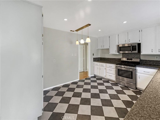 529 Esther Way, Redlands, CA 92373 - kitchen featuring dark countertops, stainless steel appliances, recessed lighting, and white cabinets