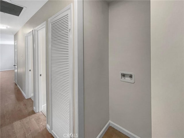 529 Esther Way, Redlands, CA 92373 - hall with wood finished floors, visible vents, and baseboards
