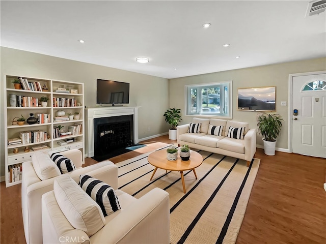 529 Esther Way, Redlands, CA 92373 - living area featuring recessed lighting, wood finished floors, baseboards, visible vents, and a fireplace with flush hearth