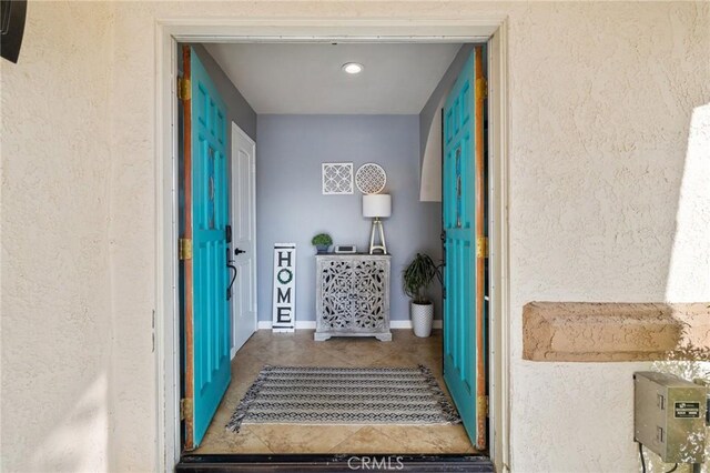 43590 Warner Trl, Palm Desert, CA 92211 - property entrance featuring stucco siding