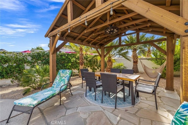 43590 Warner Trl, Palm Desert, CA 92211 - view of patio featuring outdoor dining space and a gazebo