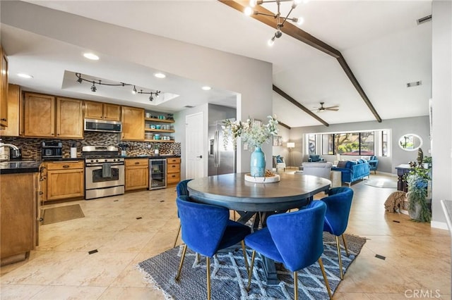 43590 Warner Trl, Palm Desert, CA 92211 - dining room with a ceiling fan, visible vents, vaulted ceiling with beams, and wine cooler