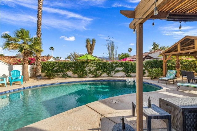 43590 Warner Trl, Palm Desert, CA 92211 - view of swimming pool featuring a fenced in pool, a gazebo, a patio area, and a fenced backyard