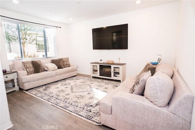 15188 Horizon St Unit 8, Fontana, CA 92336 - living area with wood finished floors and recessed lighting
