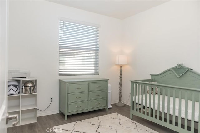 15188 Horizon St Unit 8, Fontana, CA 92336 - bedroom with baseboards and dark wood finished floors
