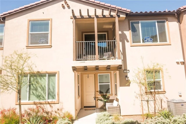15188 Horizon St Unit 8, Fontana, CA 92336 - view of front facade with stucco siding and a tile roof