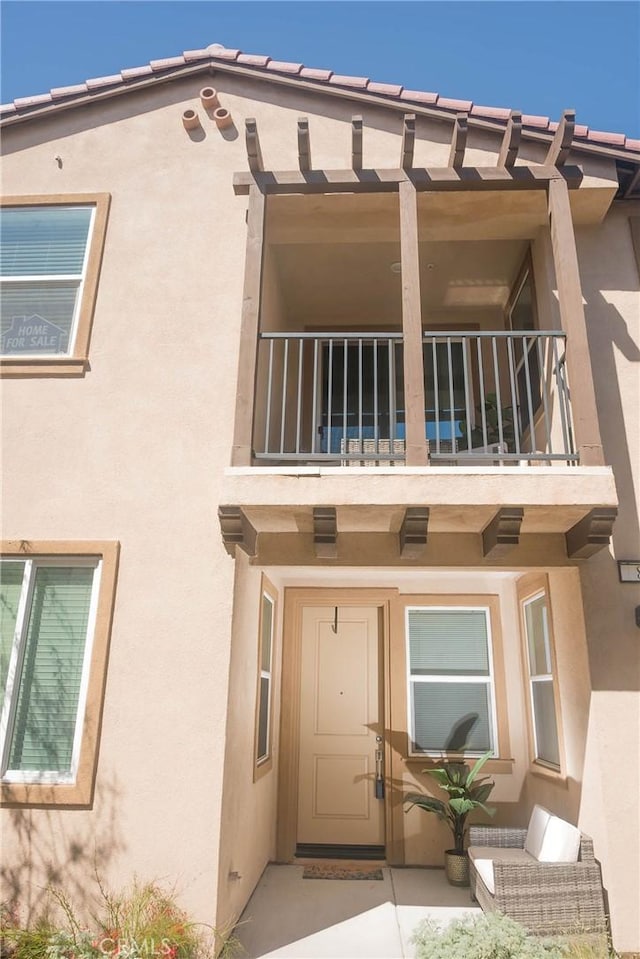 15188 Horizon St Unit 8, Fontana, CA 92336 - exterior space with a balcony and stucco siding