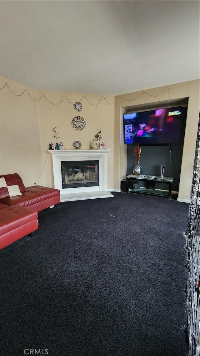 12613 Torrey Pine Rd, Moreno Valley, CA 92555 - unfurnished living room with carpet flooring and a glass covered fireplace