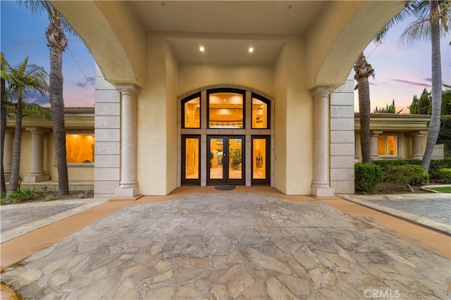 1199 Village Dr, Chino Hills, CA 91709 - view of exterior entry featuring french doors and stucco siding