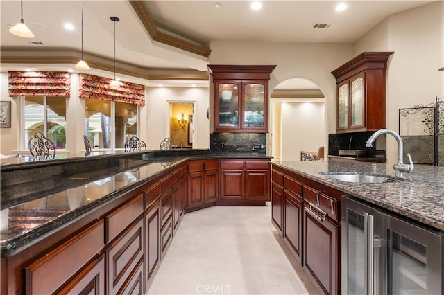 1199 Village Dr, Chino Hills, CA 91709 - bar area featuring wine cooler, a sink, tasteful backsplash, pendant lighting, and crown molding