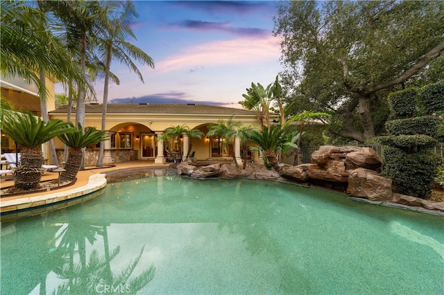 outdoor pool featuring a patio area