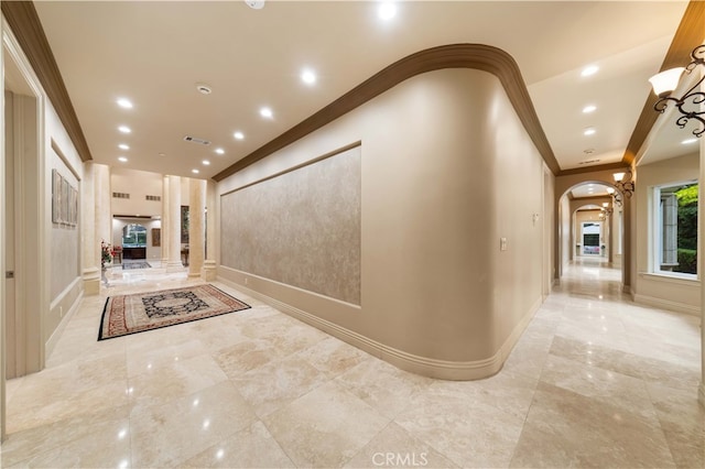 1199 Village Dr, Chino Hills, CA 91709 - hallway featuring arched walkways, ornamental molding, and baseboards