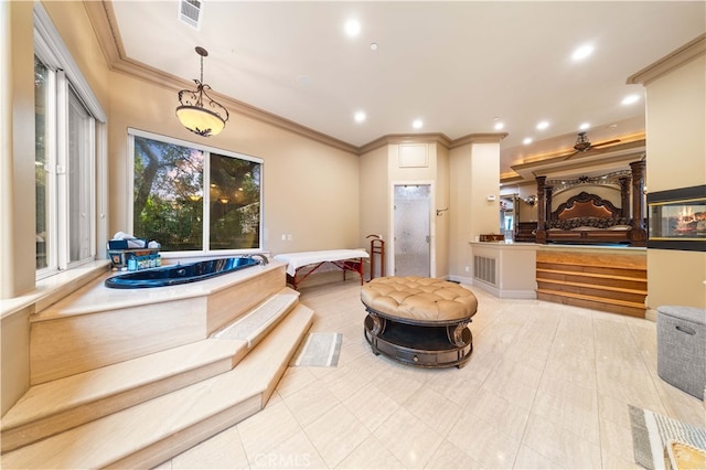 bathroom with ornamental molding, visible vents, recessed lighting, and a garden tub