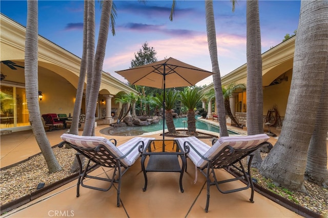 view of patio with an outdoor pool