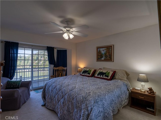 406 Delle Dr, Crestline, CA 92325 - carpeted bedroom with ceiling fan and access to outside