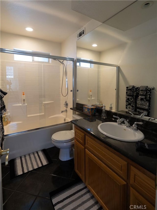 406 Delle Dr, Crestline, CA 92325 - full bathroom featuring washtub / shower combination, vanity, tile patterned flooring, toilet, and visible vents