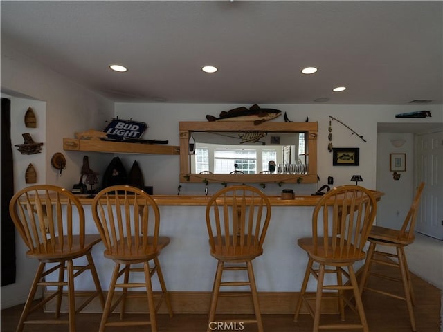 406 Delle Dr, Crestline, CA 92325 - kitchen featuring a kitchen bar, visible vents, and recessed lighting