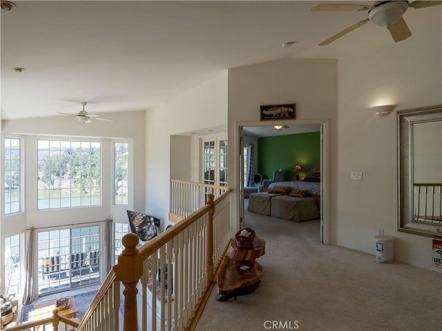 406 Delle Dr, Crestline, CA 92325 - hallway featuring carpet, an upstairs landing, and vaulted ceiling