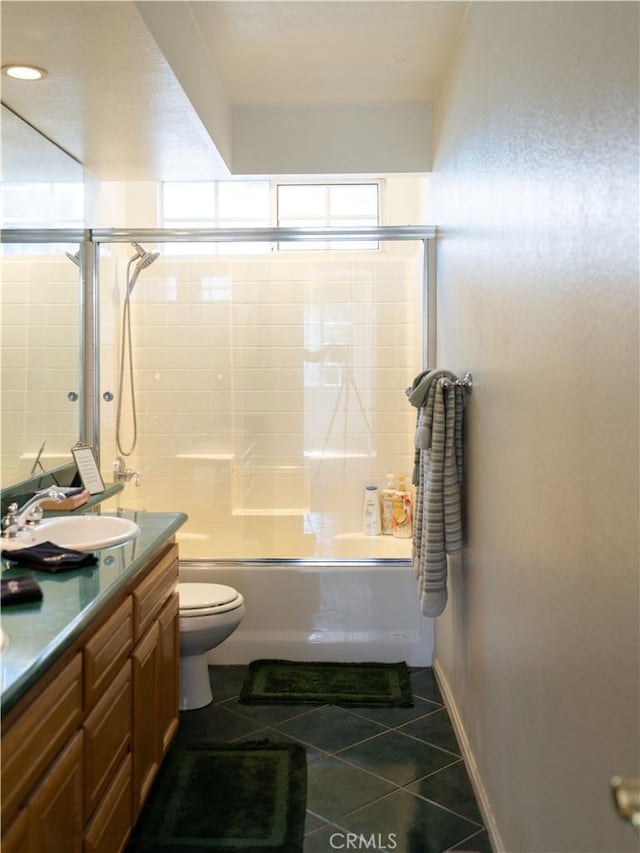406 Delle Dr, Crestline, CA 92325 - full bath with toilet, tile patterned floors, vanity, and shower / bath combination