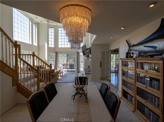 406 Delle Dr, Crestline, CA 92325 - carpeted dining room featuring recessed lighting, a notable chandelier, and stairway