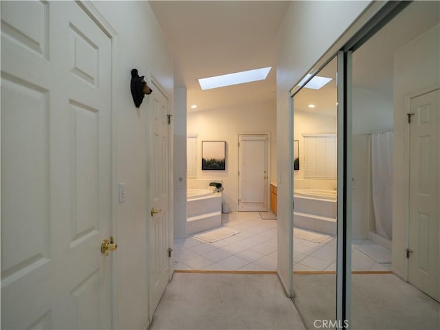 406 Delle Dr, Crestline, CA 92325 - hall with a skylight, light tile patterned floors, and recessed lighting