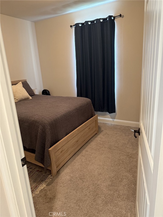 1019 El Molino Ave, Clovis, CA 93619 - bedroom with light colored carpet and baseboards