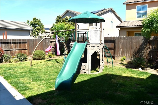 1019 El Molino Ave, Clovis, CA 93619 - view of playground featuring a yard and a fenced backyard