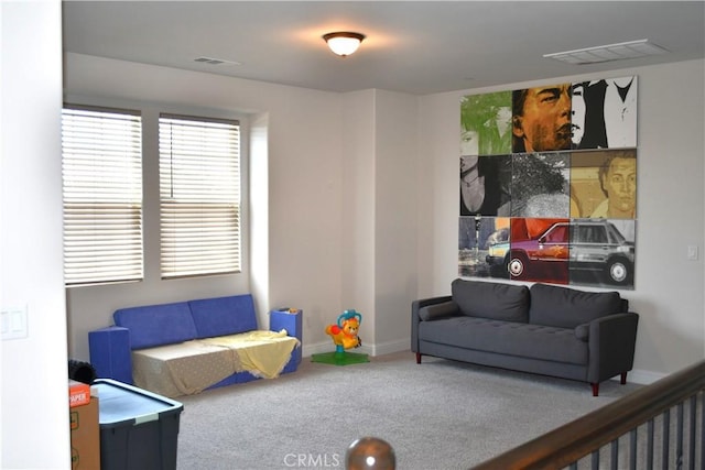 1019 El Molino Ave, Clovis, CA 93619 - rec room featuring visible vents, baseboards, and carpet