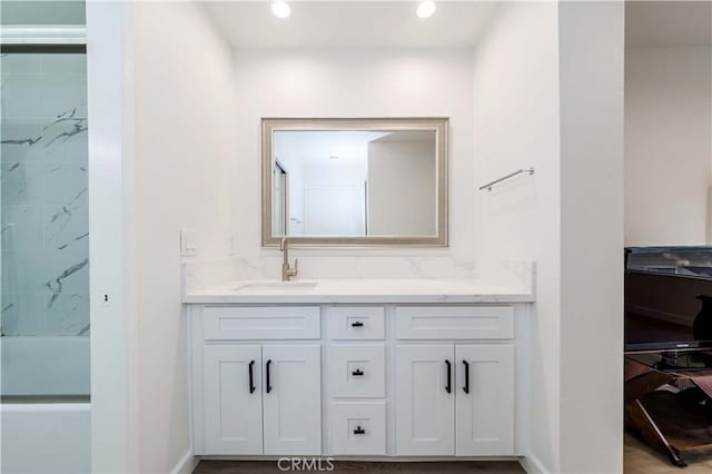 full bath featuring vanity