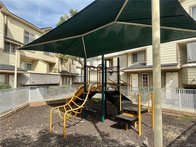 view of playground with fence