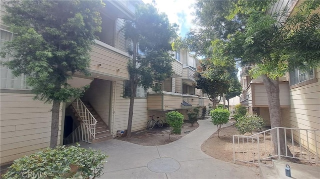 view of home's exterior with stairs