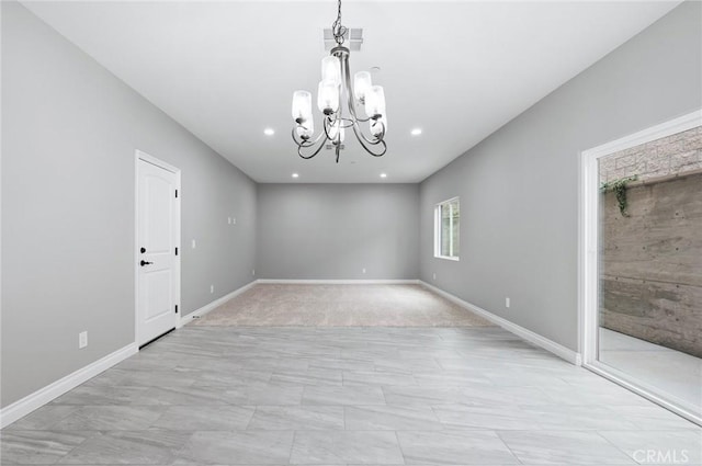unfurnished room with a chandelier, recessed lighting, visible vents, and baseboards