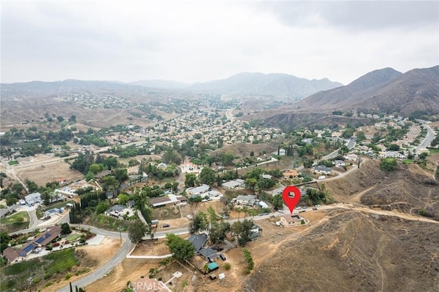 drone / aerial view featuring a mountain view