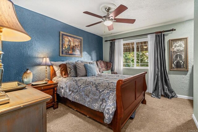 455 Ridgeview Ct, Bonita, CA 91902 - carpeted bedroom with ceiling fan, a textured wall, and baseboards