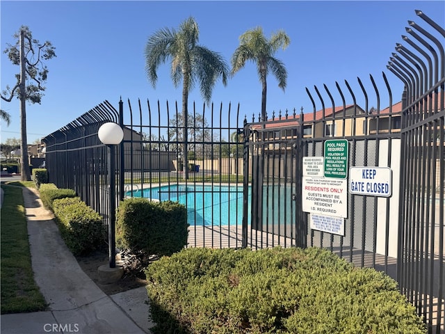 9208 Citrus Ave Unit C, Fontana, CA 92335 - view of pool with a pool and fence