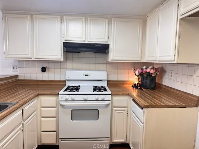 9208 Citrus Ave Unit C, Fontana, CA 92335 - kitchen featuring backsplash, under cabinet range hood, white gas range, and white cabinets