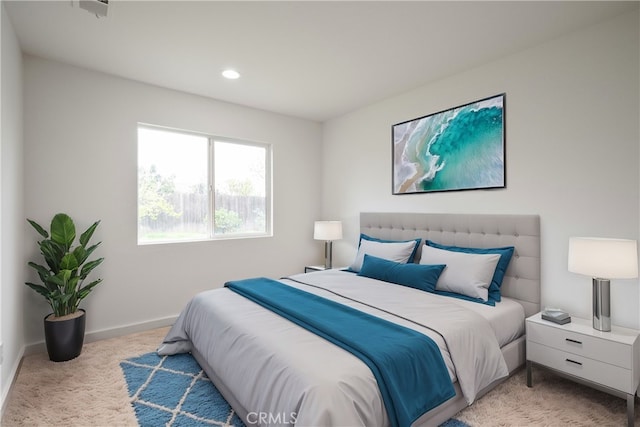 bedroom featuring baseboards, recessed lighting, and light colored carpet