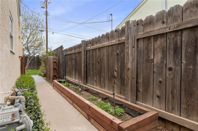 view of yard featuring a garden and fence