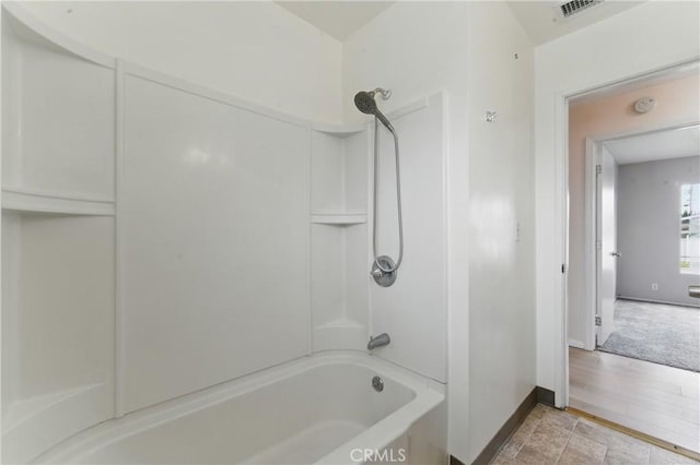1114 Stovall Ave, La Puente, CA 91745 - full bath featuring baseboards, bathtub / shower combination, and visible vents