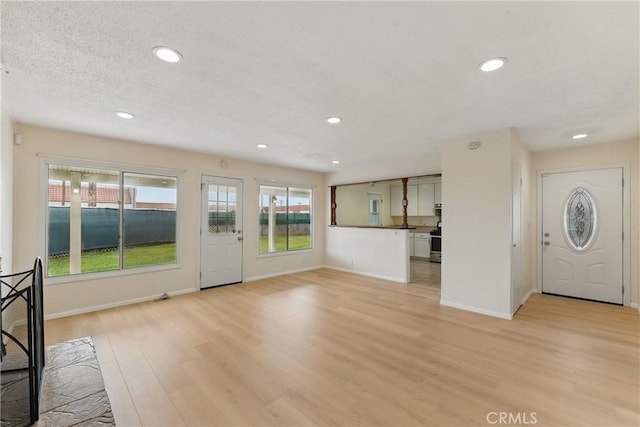 1114 Stovall Ave, La Puente, CA 91745 - entrance foyer featuring light wood-type flooring, baseboards, and recessed lighting