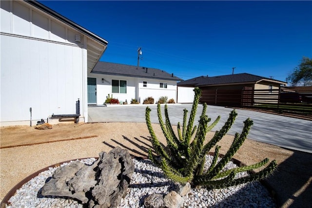 45522 Andale Ave, Lancaster, CA 93535 - view of side of property featuring fence and a patio