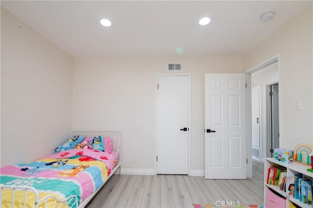 45522 Andale Ave, Lancaster, CA 93535 - bedroom featuring light wood-type flooring, recessed lighting, and baseboards