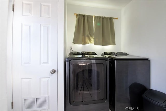 45522 Andale Ave, Lancaster, CA 93535 - clothes washing area with washer and clothes dryer