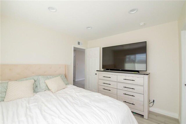45522 Andale Ave, Lancaster, CA 93535 - bedroom with baseboards, light wood-type flooring, and recessed lighting