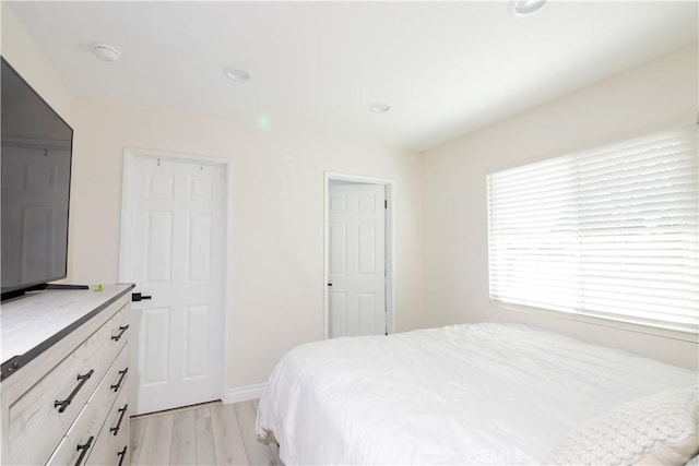 45522 Andale Ave, Lancaster, CA 93535 - bedroom featuring light wood-style floors, baseboards, and recessed lighting