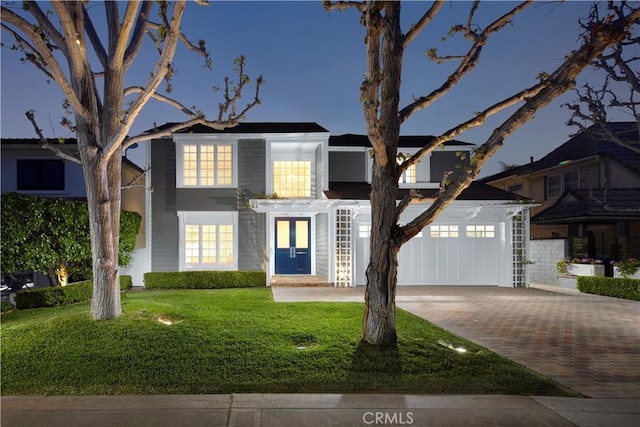 736 Harbor Island Dr, Newport Beach, CA 92660 - traditional home with french doors, decorative driveway, and a lawn