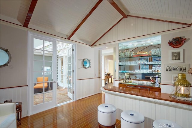 736 Harbor Island Dr, Newport Beach, CA 92660 - bar with wood-type flooring, a wainscoted wall, wet bar, and lofted ceiling with beams